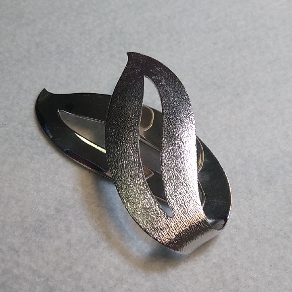 Elegant Silver Abstract Brooch